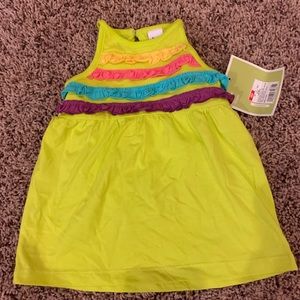 Adorable green and rainbow summer dress.